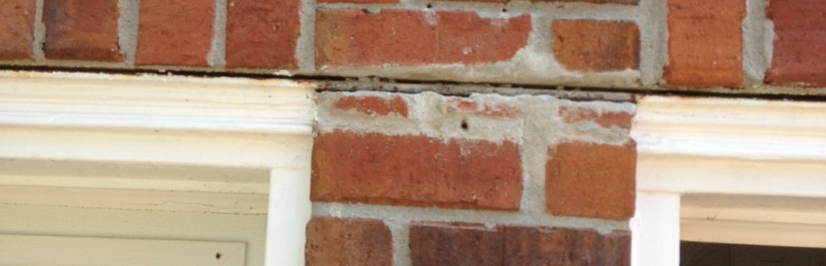 Brick crack above a garage door center column